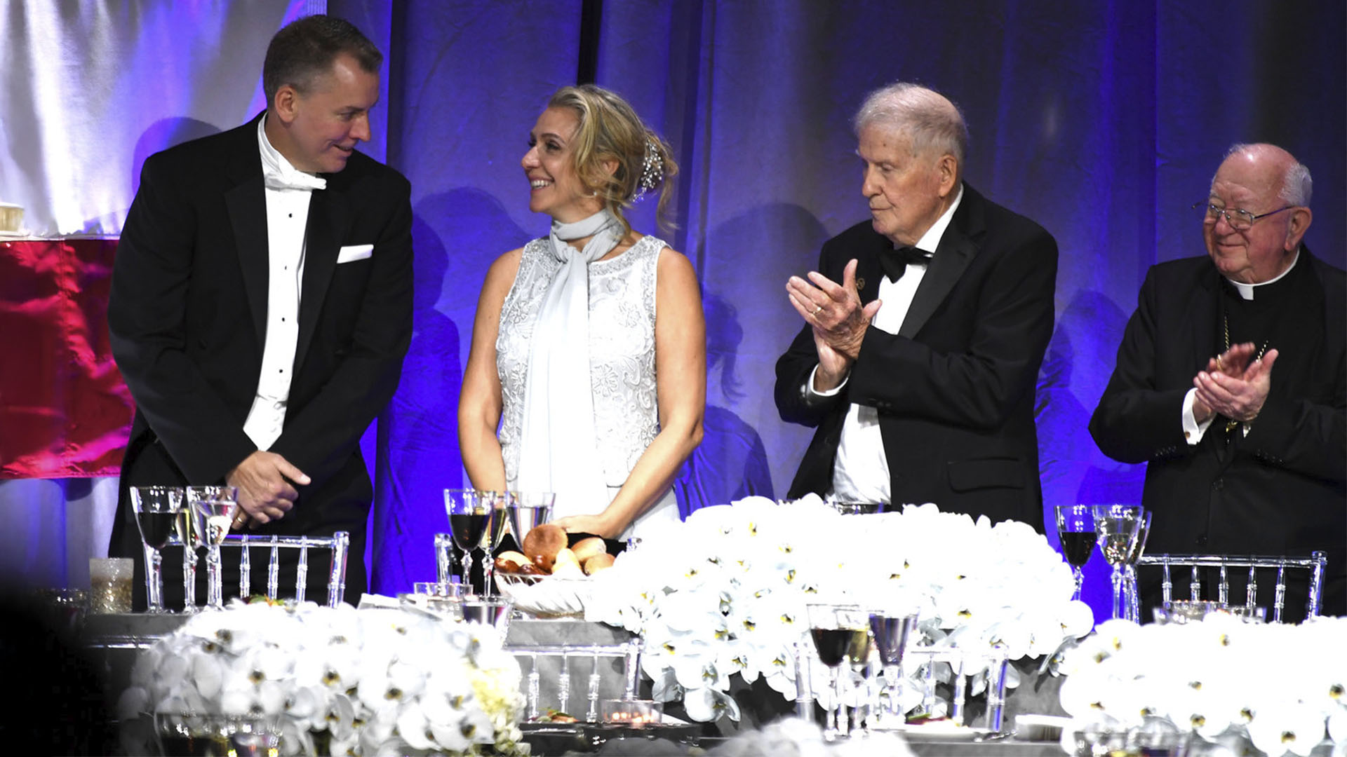Bettina Alonso on stage at a gala dinner
